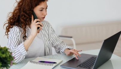 beautiful-businesswoman-working-projects-young-businesswoman-talking-phone-office-desk_231208-14199
